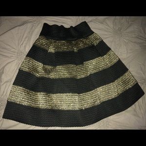 Stretchy black and gold skirt.